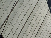 海珠區(qū)龍譚村六層自建房?jī)A斜扶正